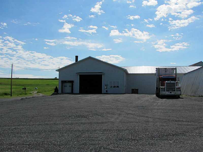 596 New Canada Road New Canada, ME 04743 - Photo 7 of 35 Exterior Front. Equipment buildings...