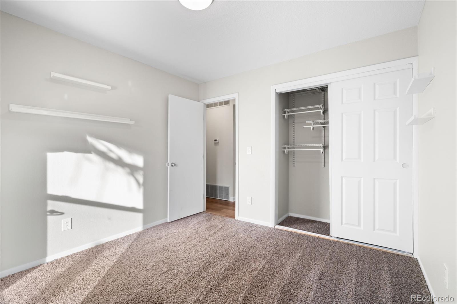 16373 East Rice Place, Unit B Aurora, CO 80015 - Photo 22 of 26 a view of an empty room