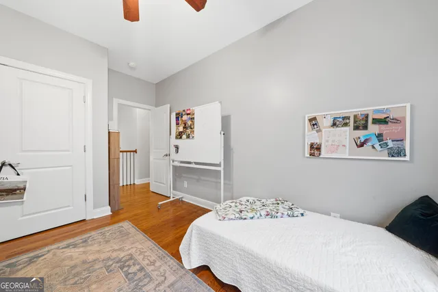 a bedroom with a bed and a cabinets