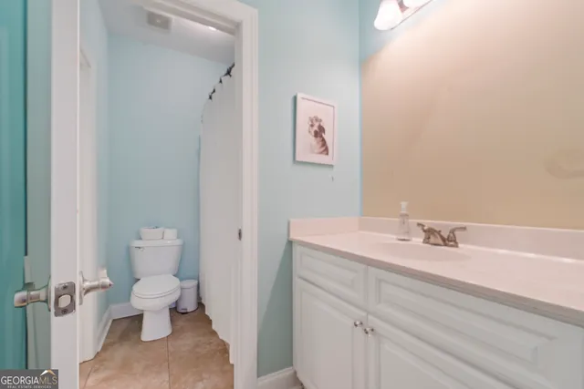 a bathroom with a sink and a toilet