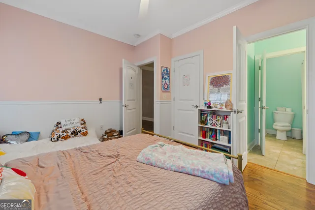 a bedroom with a bed and a cabinets