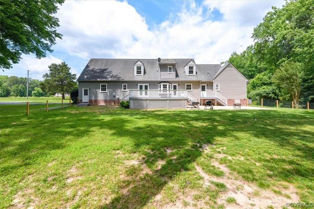 4555 Takach Road Prince George, VA 23875 - Photo 47 of 49 a view of a house with a big yard and large trees