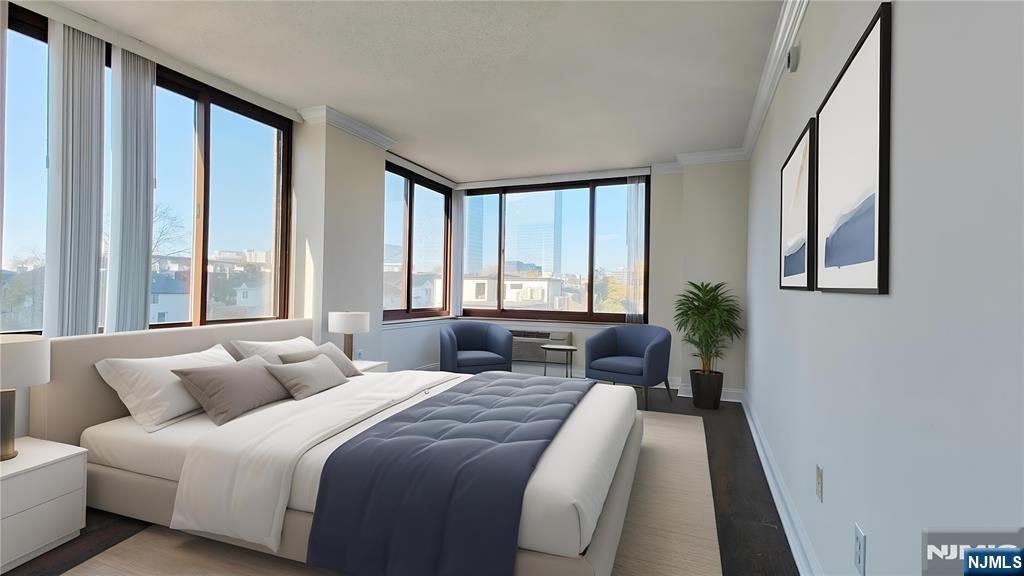 100 Old Palisade Road, Unit 1711 Fort Lee, NJ 07024 - Photo 16 of 26 a bedroom with bed and a large window