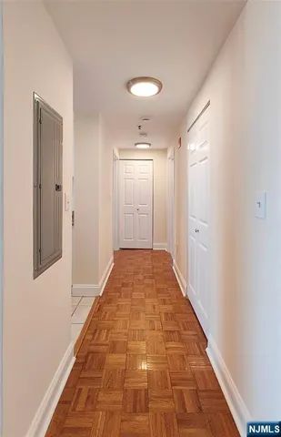 a bathroom with a vanity and a shower