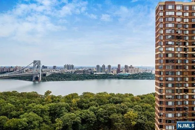 a view of a lake with building in front of it