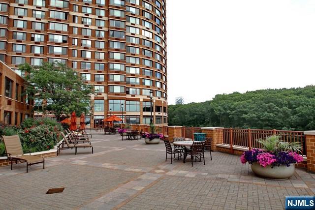 100 Old Palisade Road, Unit 1711 Fort Lee, NJ 07024 - Photo 6 of 26 a view of outdoor space patio and swimming pool