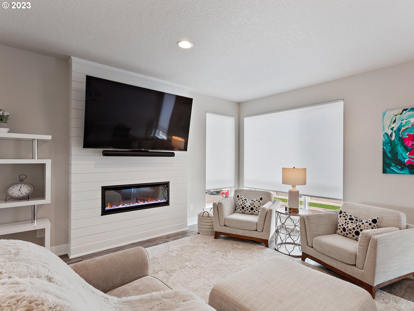17100 Southwest Albatross Lane Beaverton, OR 97007 - Photo 9 of 48 a living room with furniture and a flat screen tv