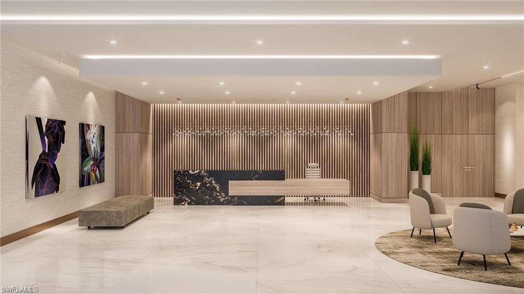 1925 Metropolitan Boulevard, Unit 1205 Naples, FL 34104 - Photo 14 of 14 a living room with furniture