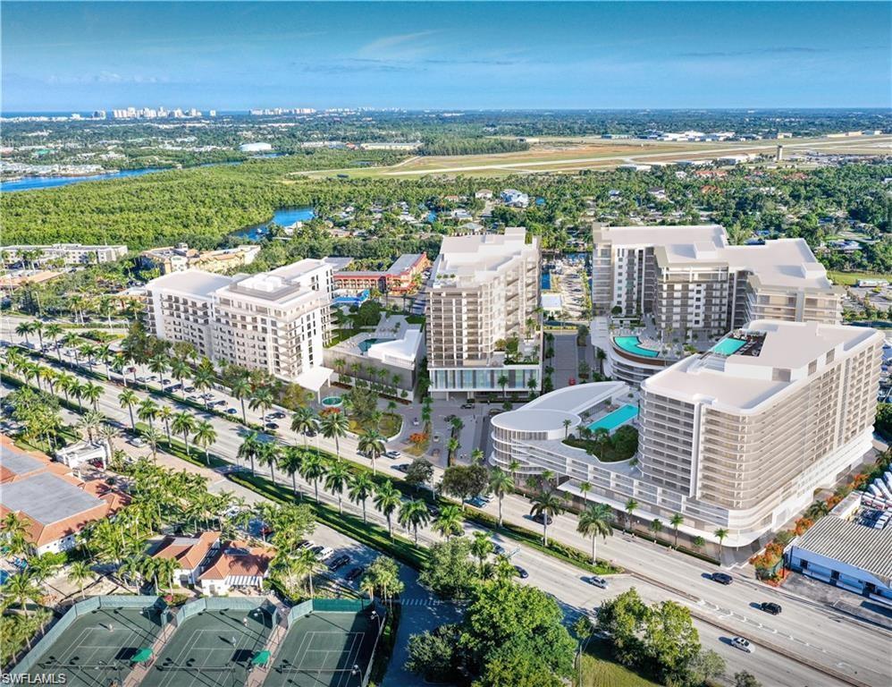 1925 Metropolitan Boulevard, Unit 1205 Naples, FL 34104 - Photo 3 of 14 a view of a city from a terrace