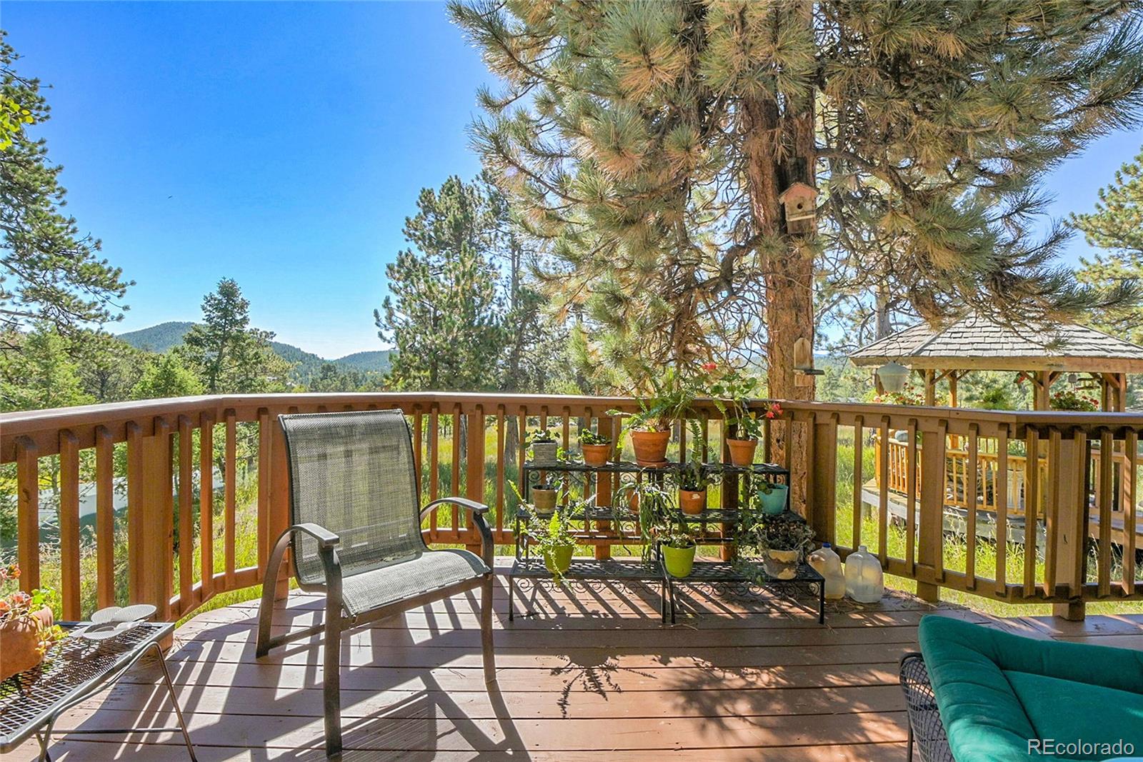 13082 South Wamblee Valley Road Conifer, CO 80433 - Photo 34 of 35 a view of a two chairs on the roof deck
