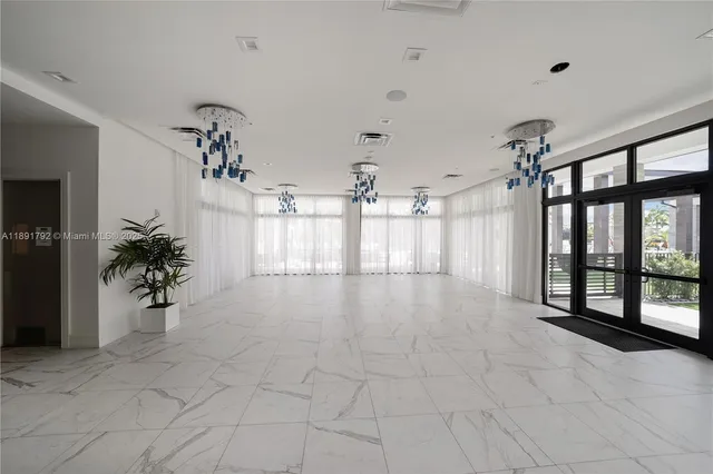 a room with furniture and air hockey table