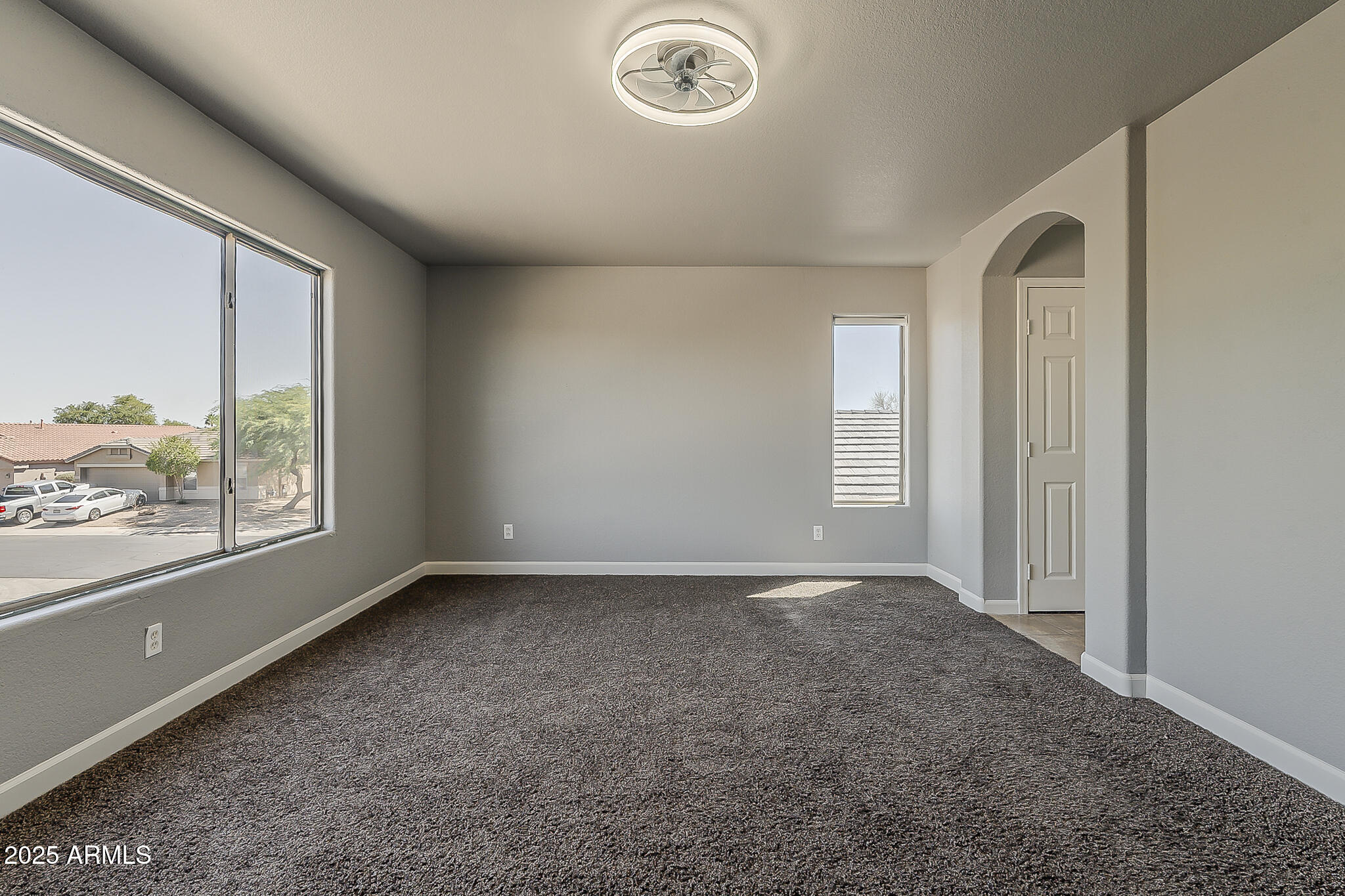 21928 North Braden Road Maricopa, AZ 85138 - Photo 42 of 58 an empty room with window