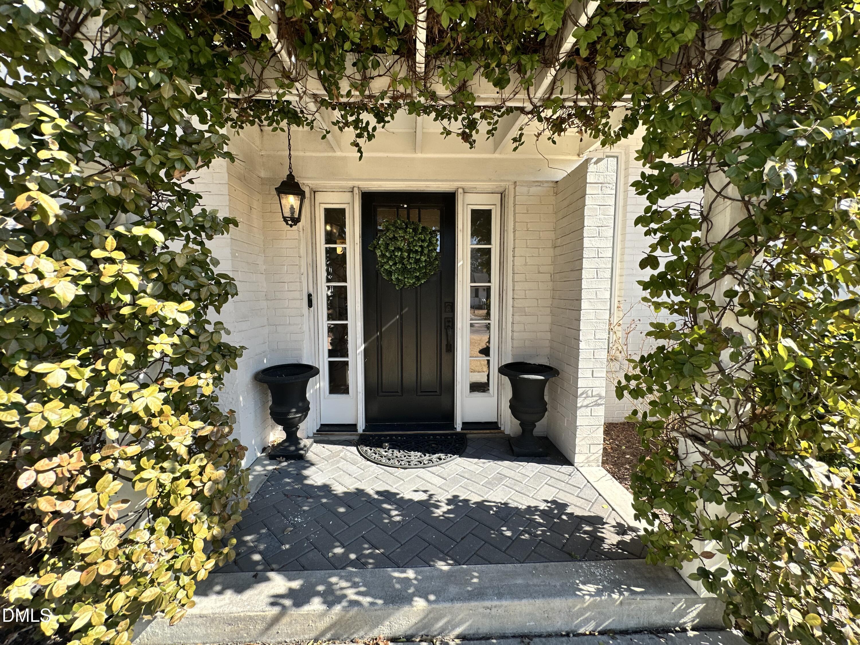 4512 Drexel Drive Raleigh, NC 27609 - Photo 32 of 36 a front view of a house with a tree