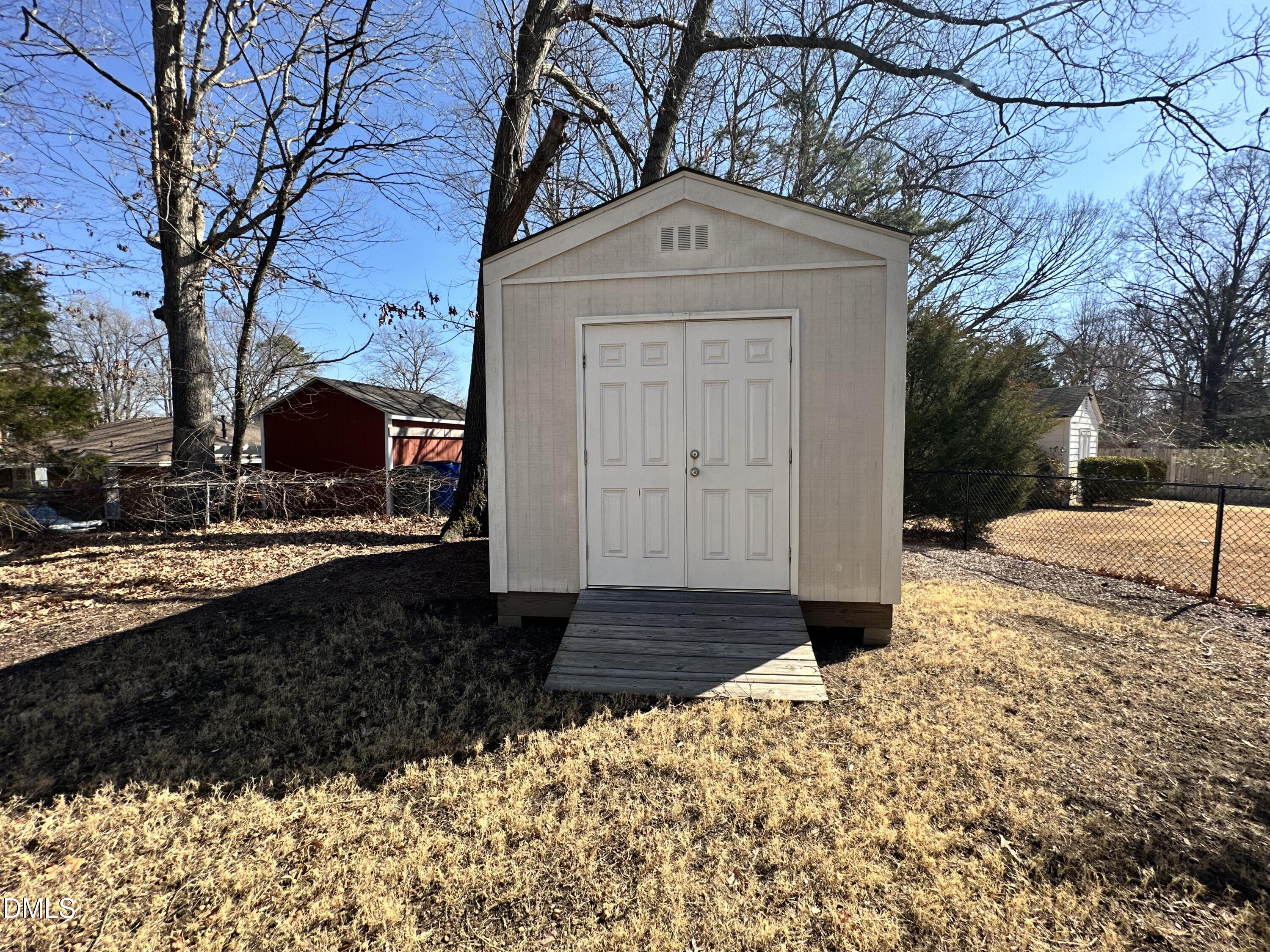 4512 Drexel Drive Raleigh, NC 27609 - Photo 36 of 36 a front view of a house with a yard