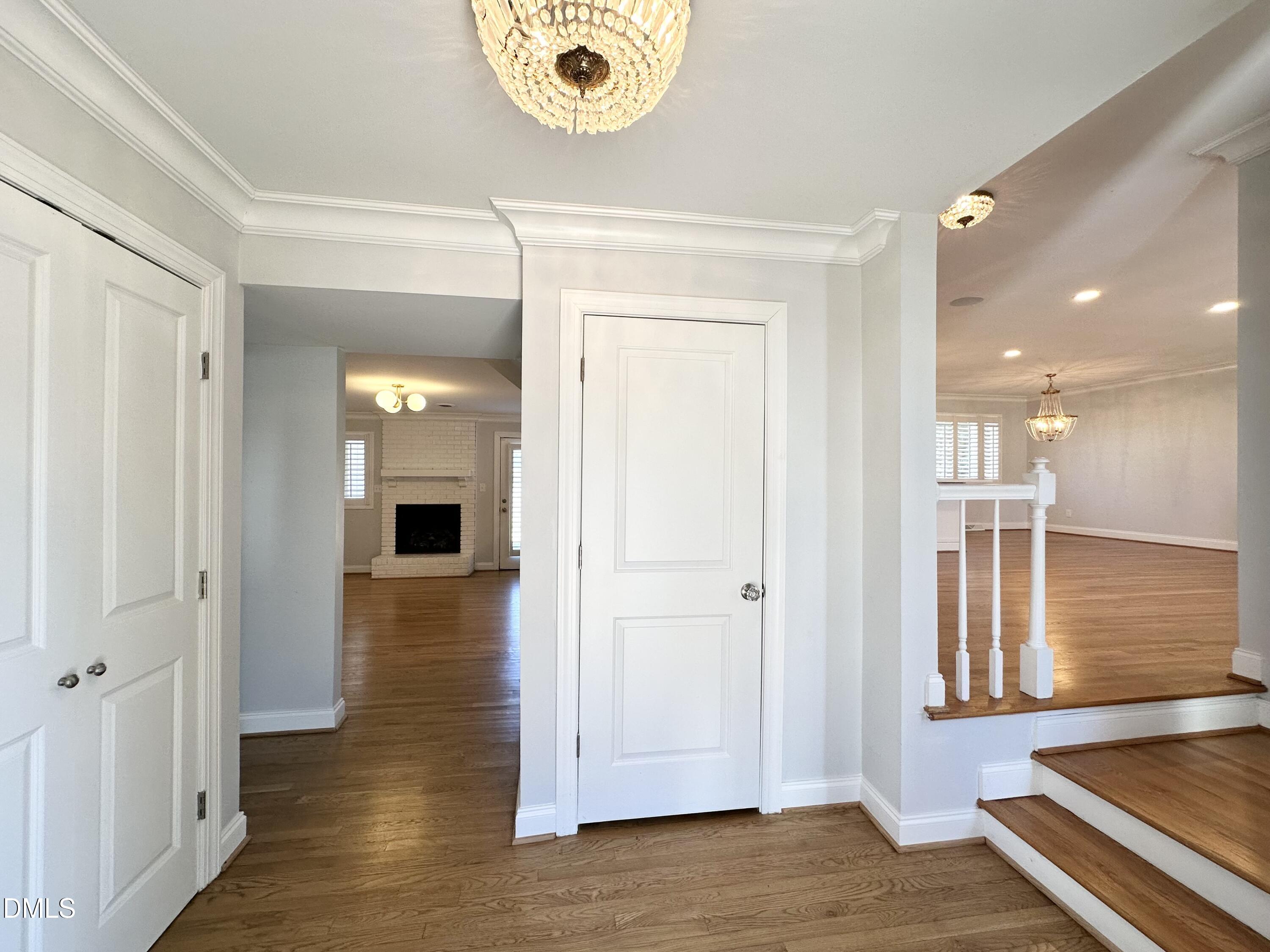 4512 Drexel Drive Raleigh, NC 27609 - Photo 6 of 36 a view of a hallway with wooden floor