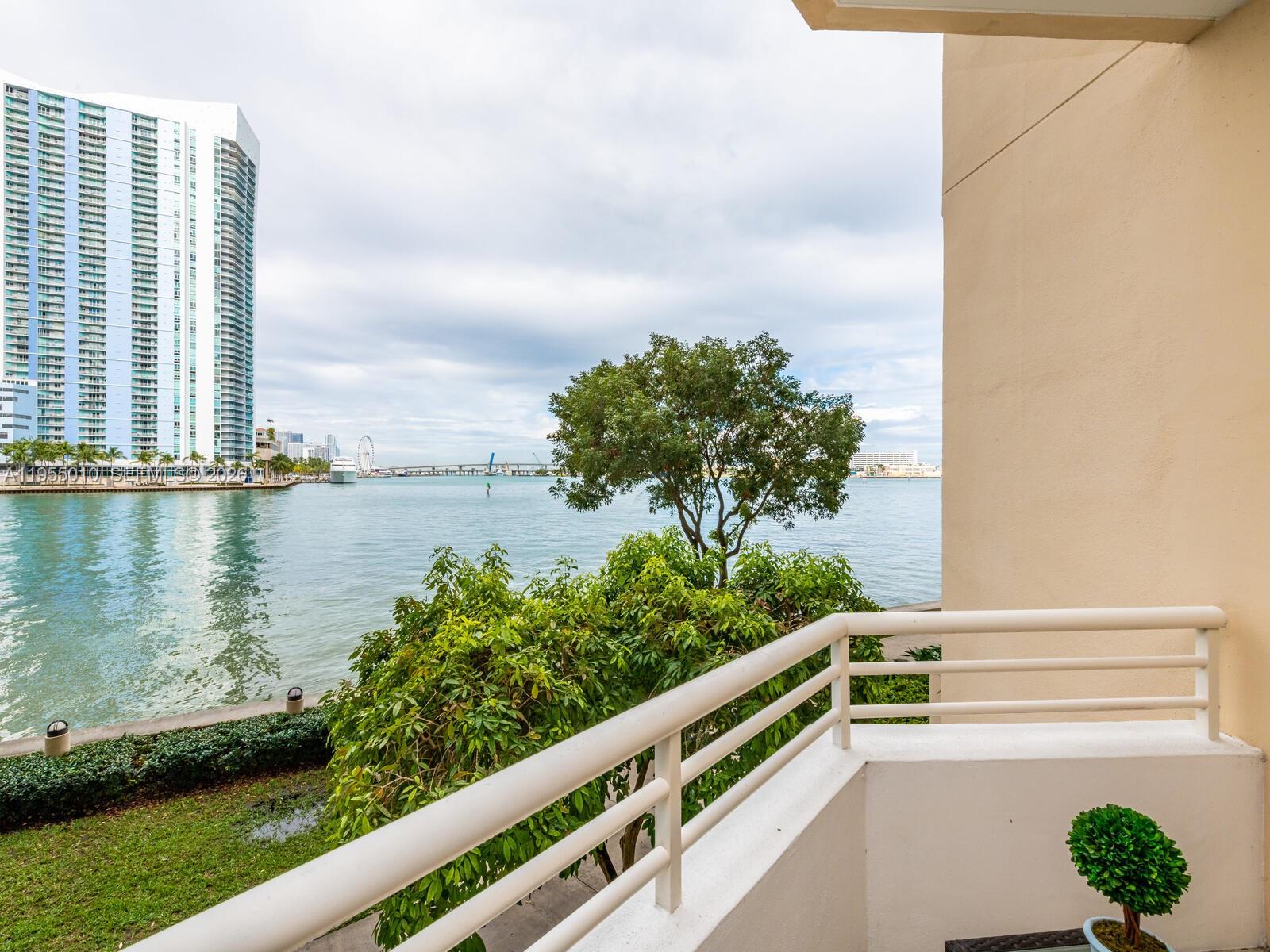 888 Brickell Key Drive, Unit 210 Miami, FL 33131 - Photo 45 of 84 a view of a balcony with lake view
