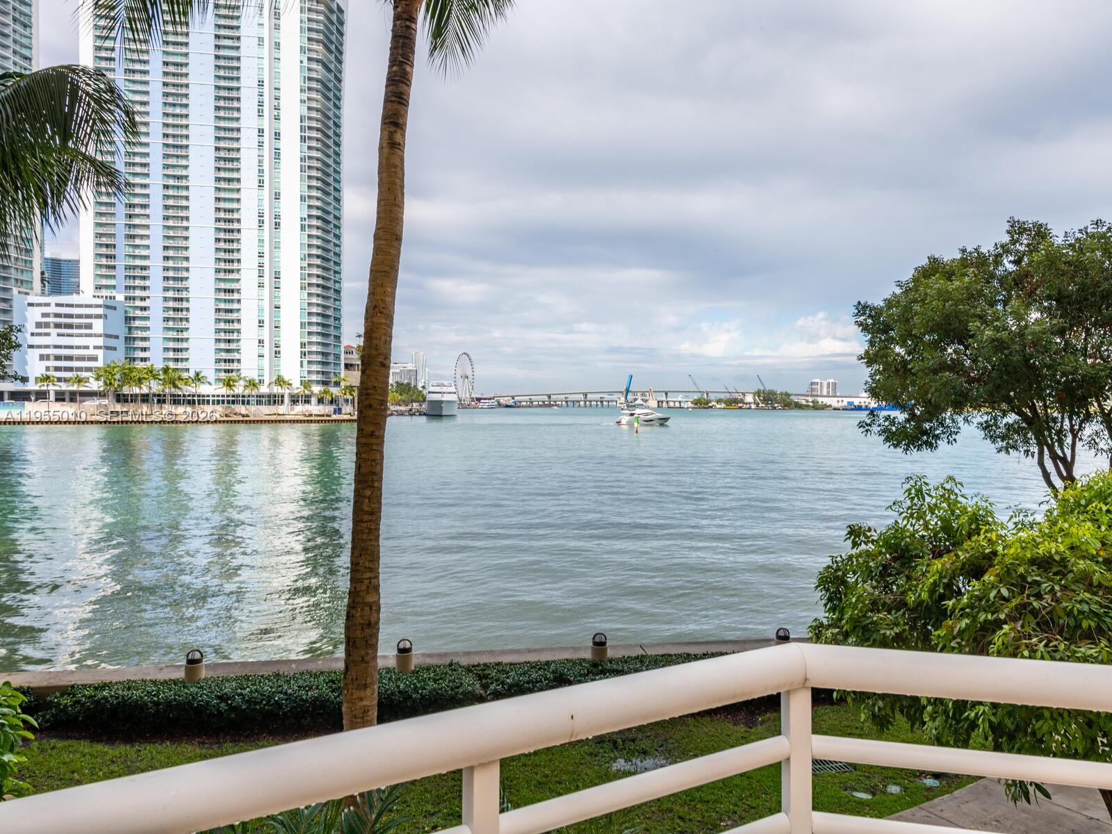 888 Brickell Key Drive, Unit 210 Miami, FL 33131 - Photo 49 of 84 a view of a lake from a balcony