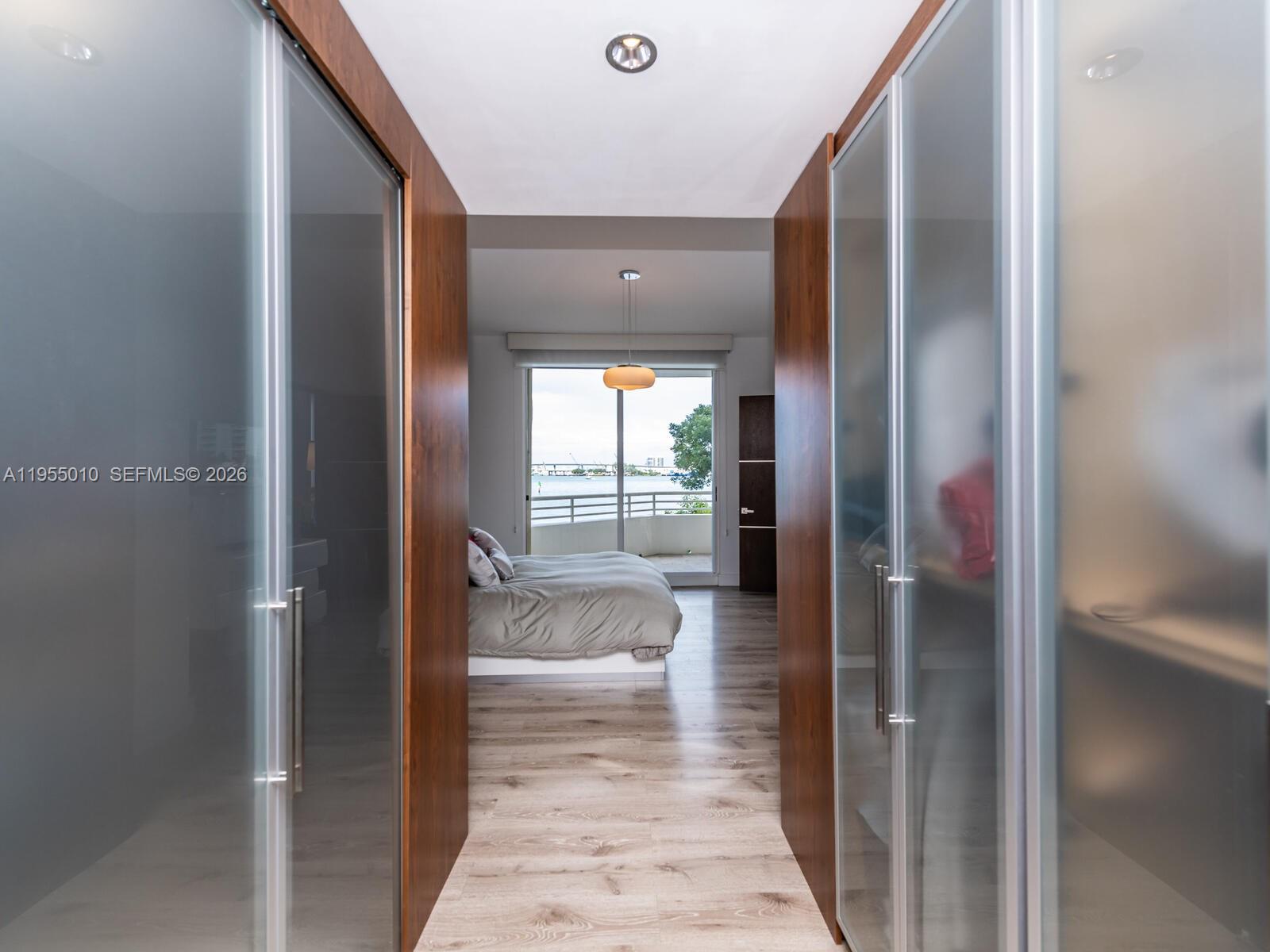 888 Brickell Key Drive, Unit 210 Miami, FL 33131 - Photo 56 of 84 a bathroom with a tub and shower