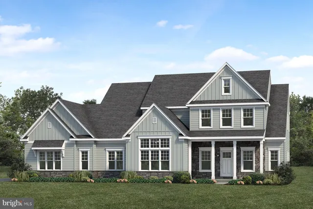 front view of a house and a yard