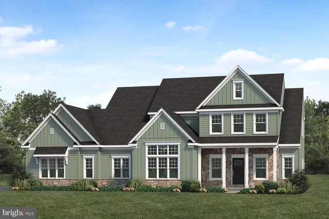 front view of a house and a yard