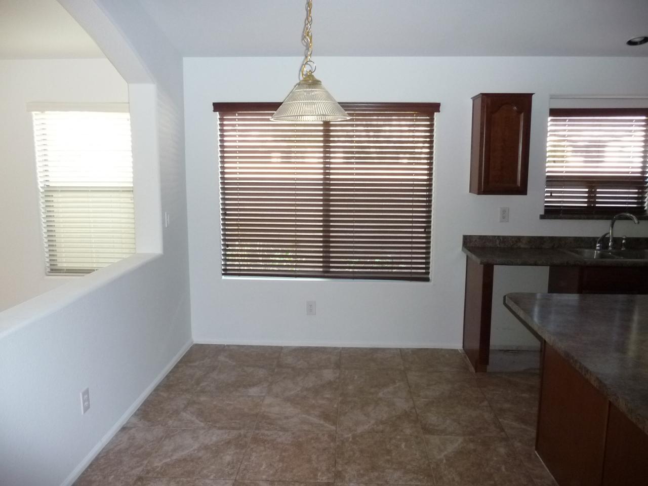 2202 West Roy Rogers Road Phoenix, AZ 85085 - Photo 3 of 17 EAT IN KITCHEN AREA