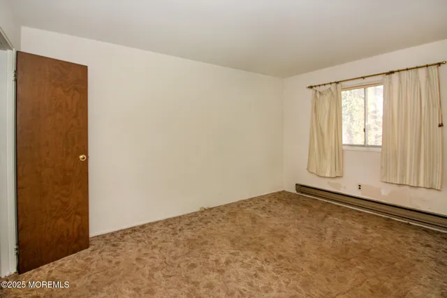 an empty room with window