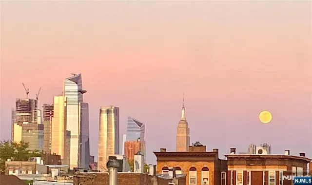 a view of a city with tall buildings