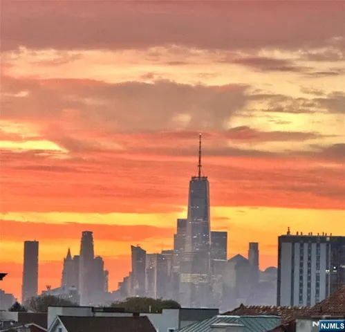 a view of a city with tall buildings