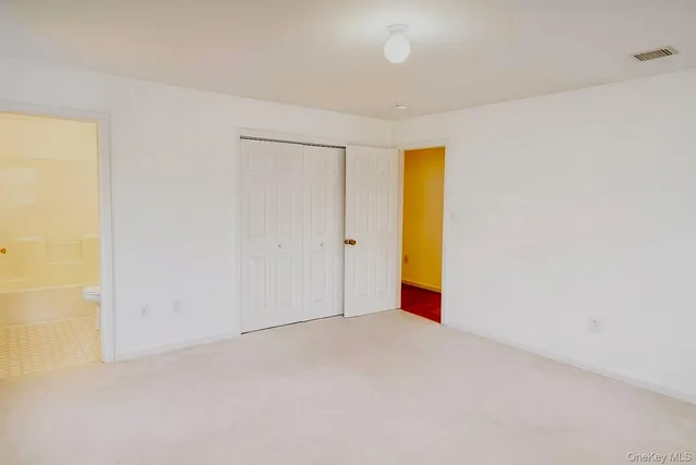 an empty room with a natural light