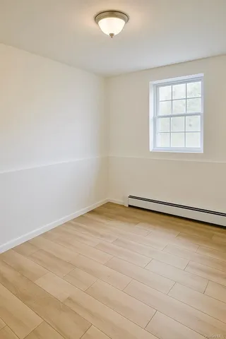 an empty room with a workbench