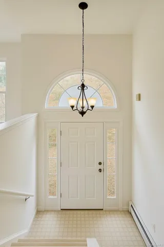 a very nice looking room with a chandelier
