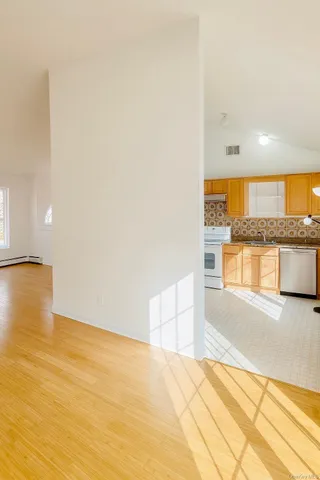 a view of an empty room and window