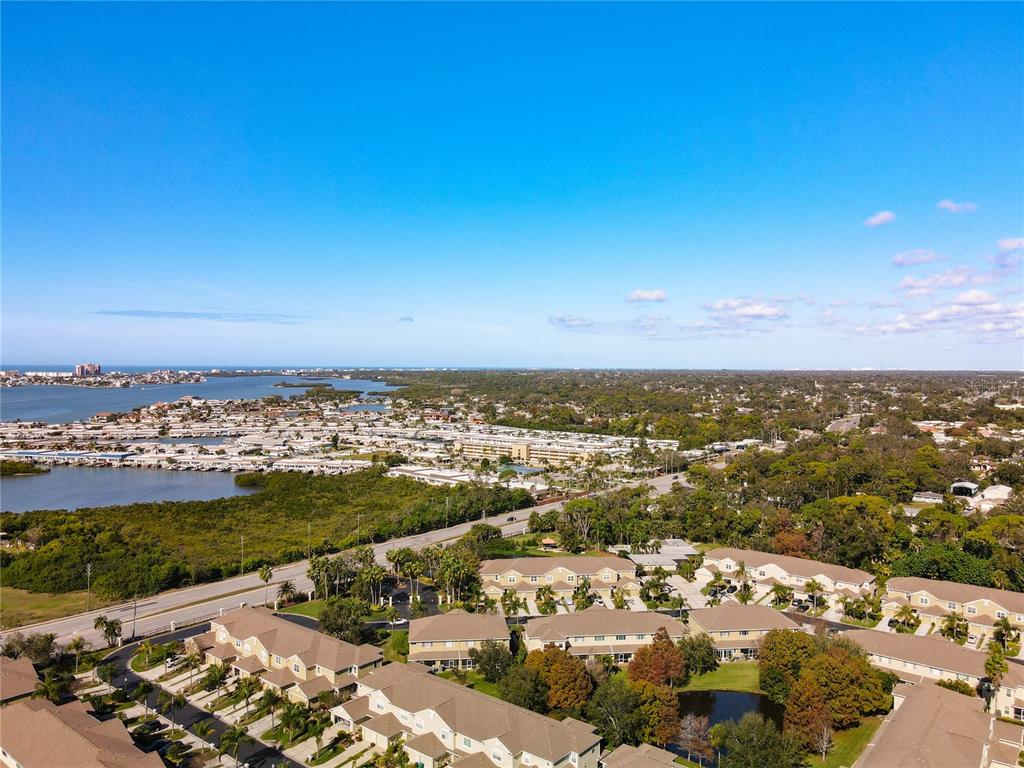 11117 Kapok Grand Circle Madeira Beach, FL 33708 - Photo 39 of 62 an aerial view of a city
