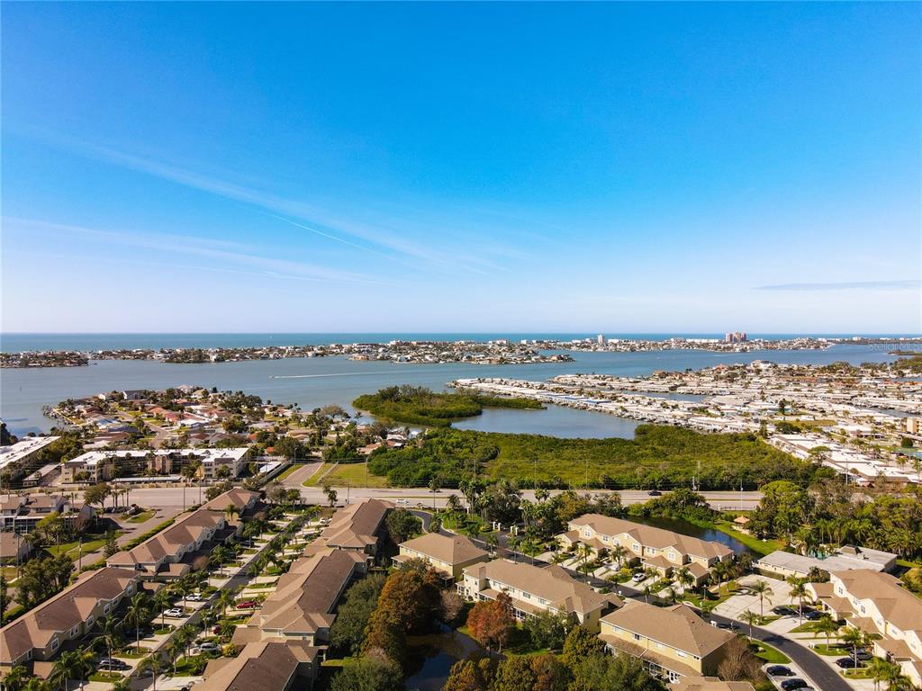 11117 Kapok Grand Circle Madeira Beach, FL 33708 - Photo 41 of 62 an aerial view of a city