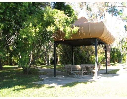 11117 Kapok Grand Circle Madeira Beach, FL 33708 - Photo 58 of 62 a view of a outdoor space