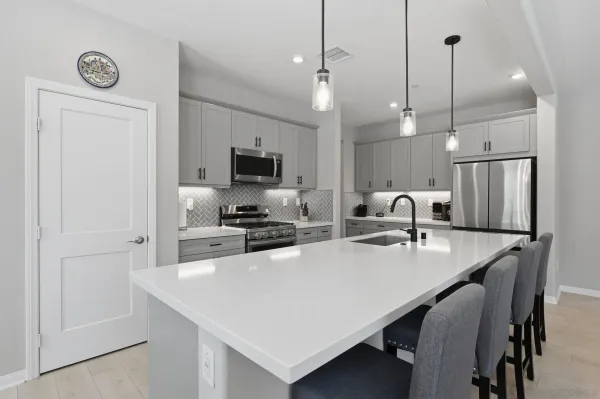 a bathroom with a tub and a shower