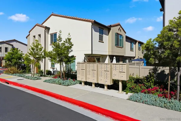 a kitchen with stainless steel appliances white cabinets and stove