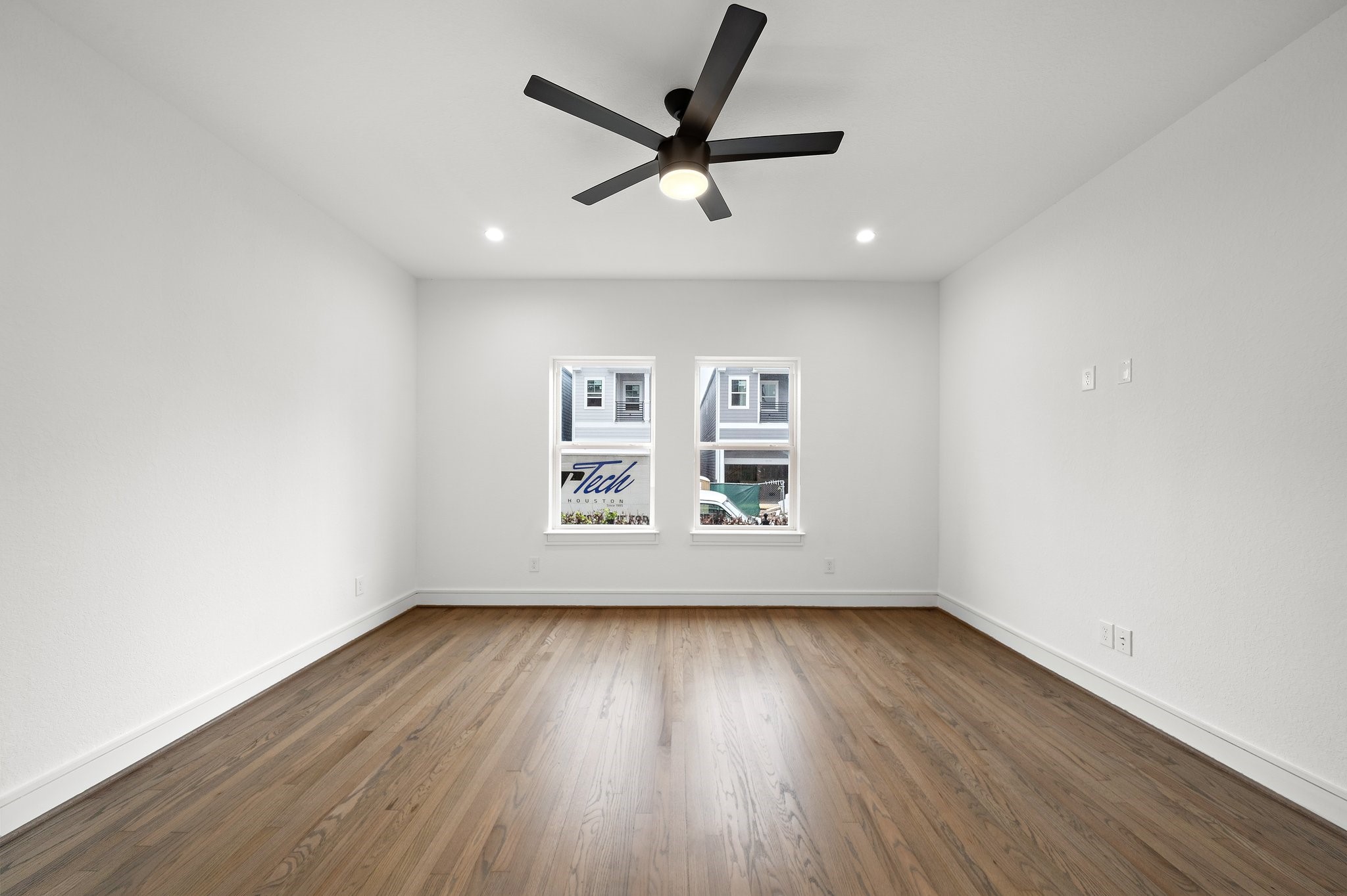 1013 East 28th Street Houston, TX 77009 - Photo 22 of 38 wooden floor in an empty room with a window