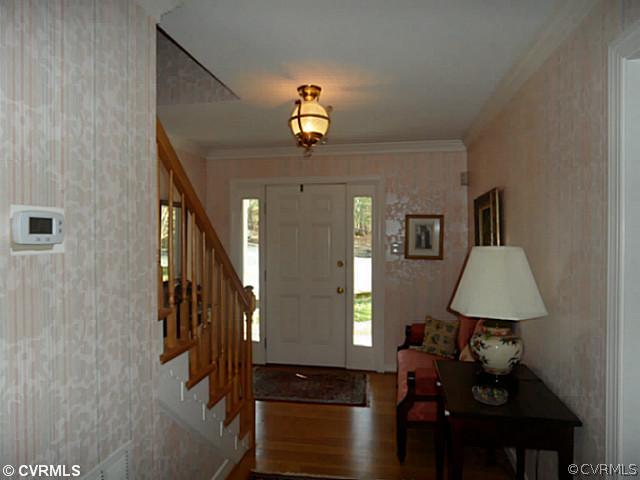 2449 Gobbler Ridge Road Powhatan, VA 23139 - Photo 2 of 24 Foyer - The foyer has hardwood floors and 2 member