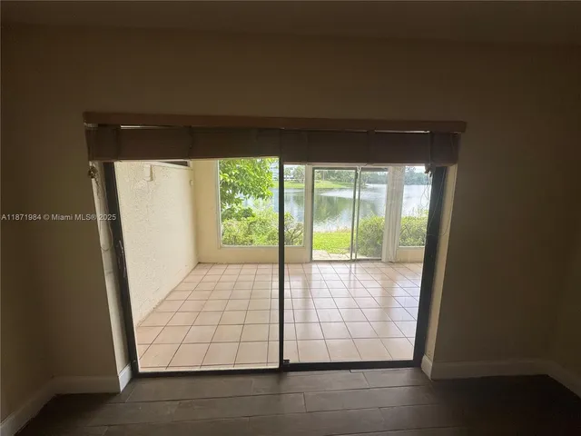 a view of empty room with front door