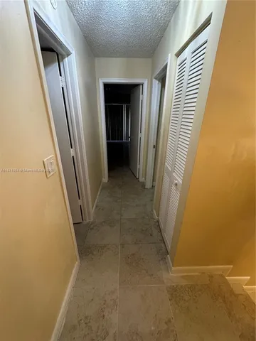 a view of hallway with stairs