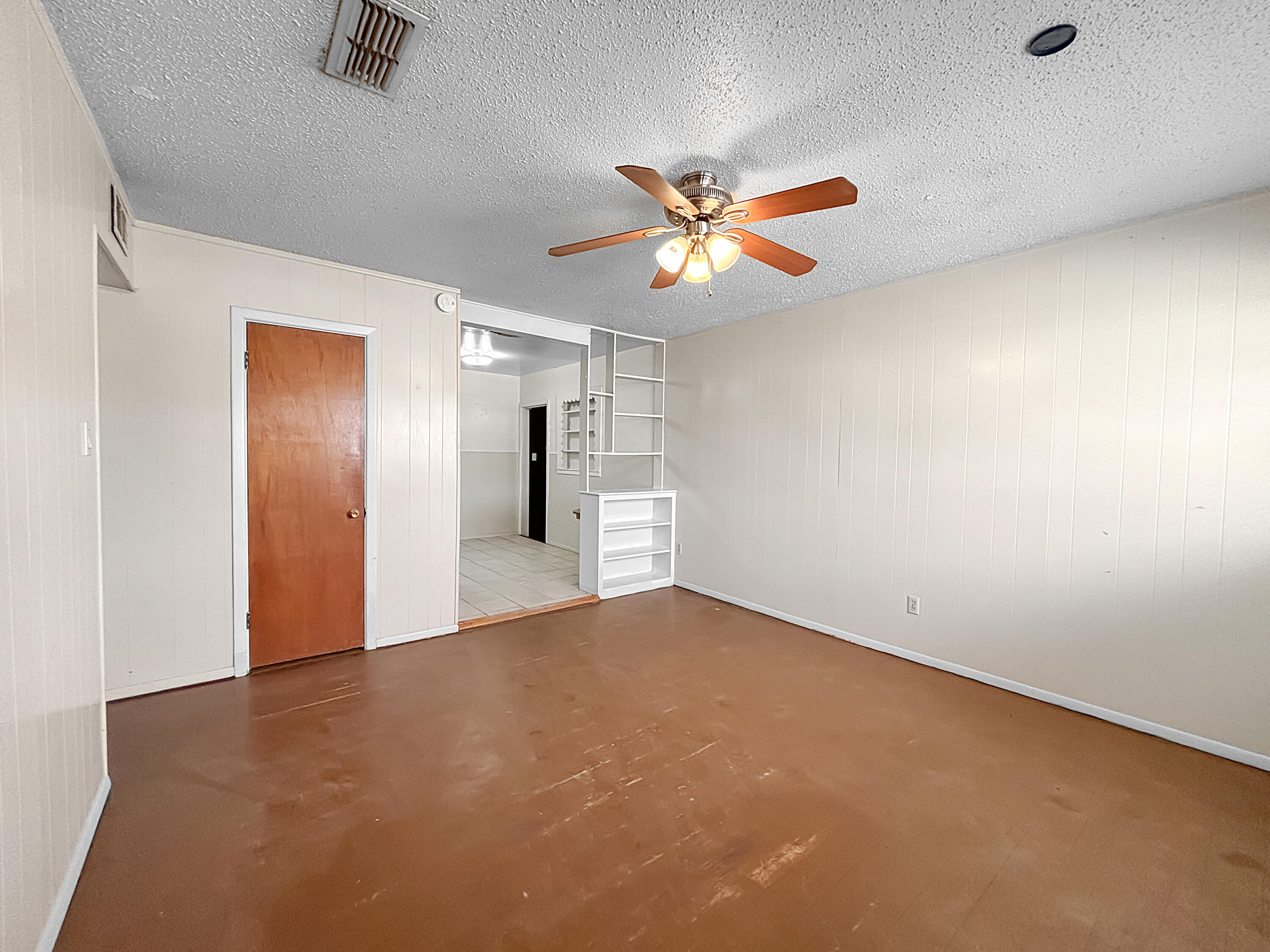 4411 45th Street Lubbock, TX 79414 - Photo 35 of 44 a view of empty room with a ceiling fan