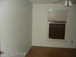 1245 Salter Path Road Atlantic Beach, NC 28512 - Photo 16 of 35 Bedroom 1-boarded windows