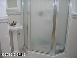 1245 Salter Path Road Atlantic Beach, NC 28512 - Photo 21 of 35 Master bath shower & sink