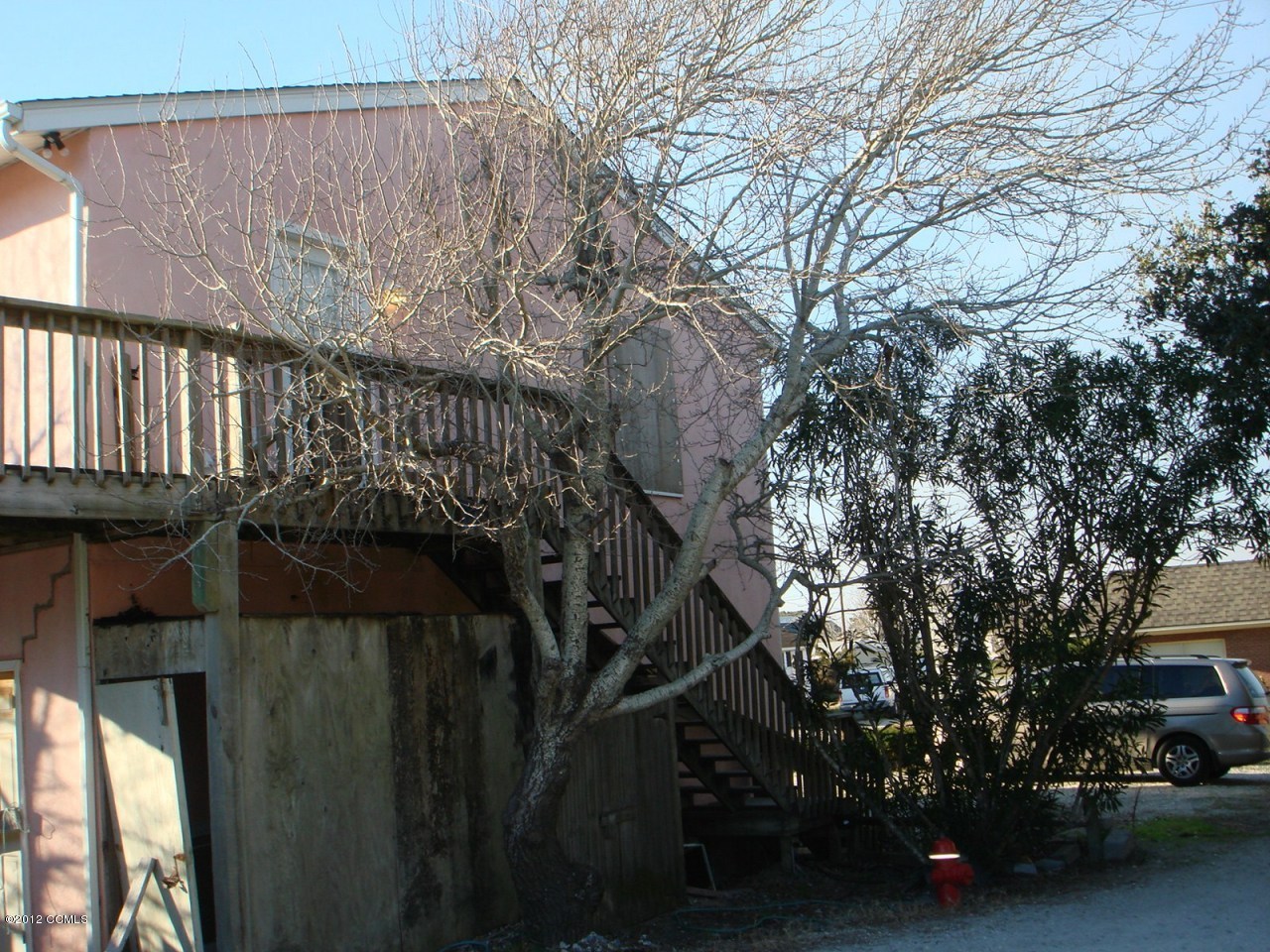 1245 Salter Path Road Atlantic Beach, NC 28512 - Photo 6 of 35 Stairs to upper deck rear-side view (Cop