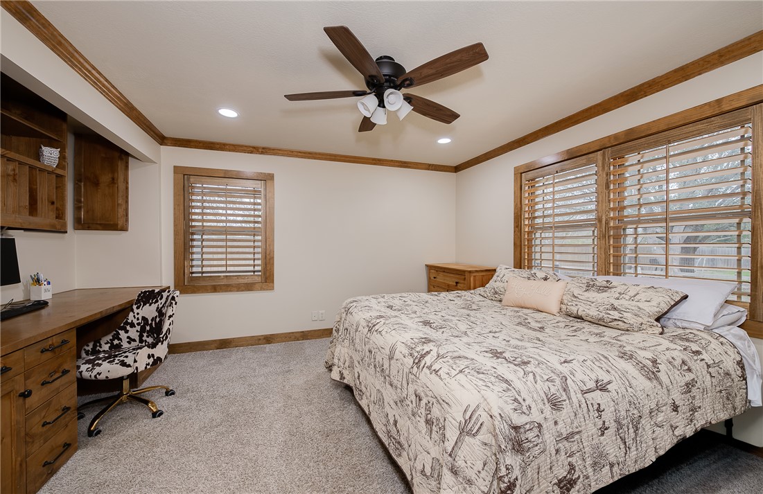 2302 Quail Run College Station, TX 77845 - Photo 13 of 49 a bedroom with a bed and a window