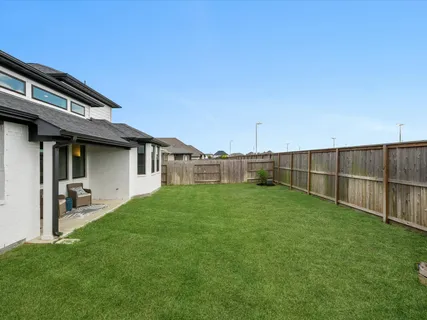 a view of a backyard with a garden