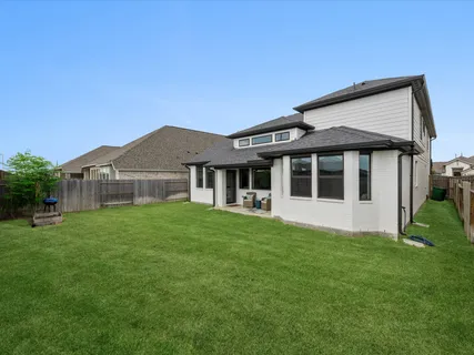 a view of a house with a big yard