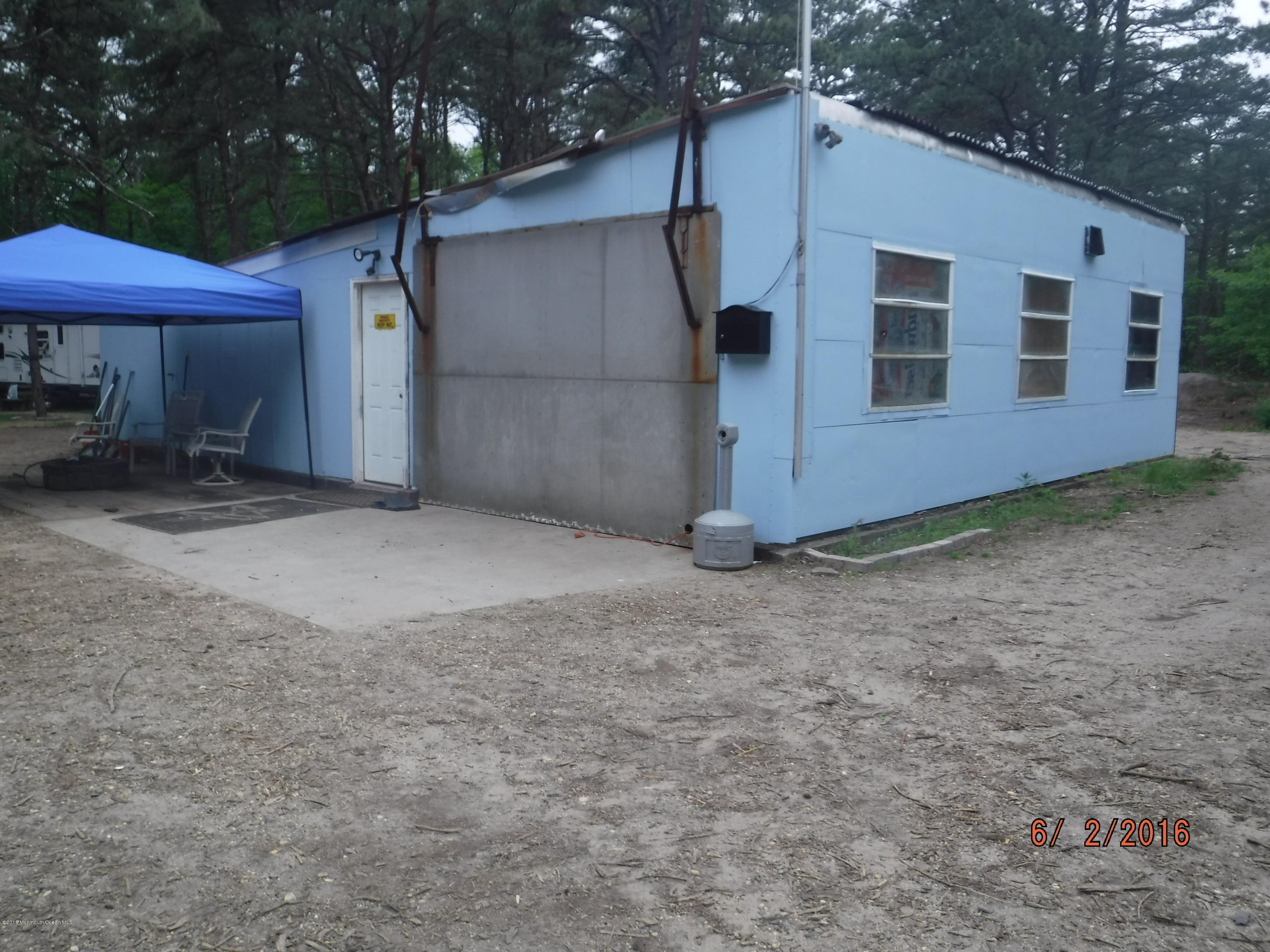 25 Douglas Lane Waretown, NJ 08758 - Photo 12 of 18 a view of a house with a yard
