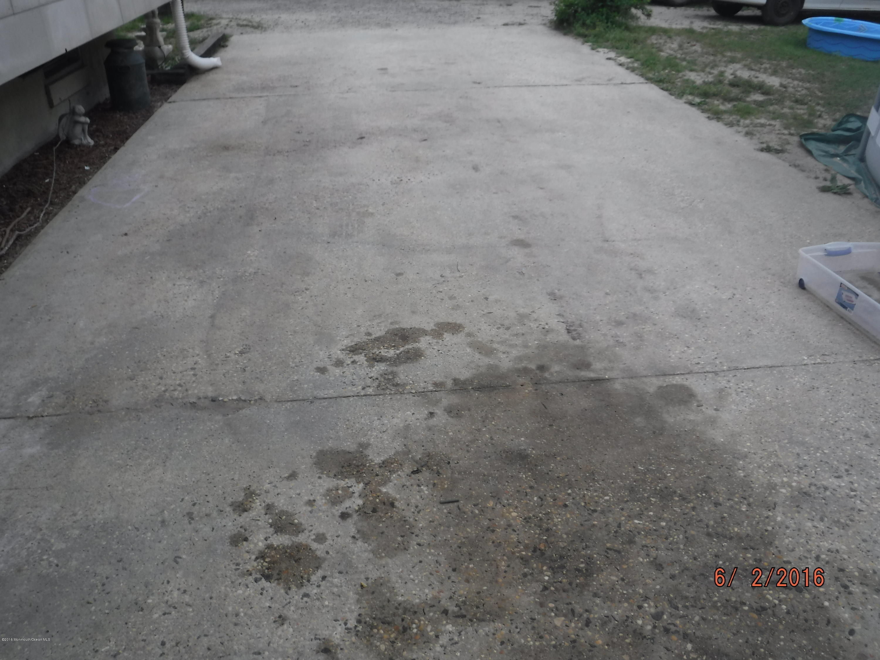 25 Douglas Lane Waretown, NJ 08758 - Photo 14 of 18 a view of a backyard of a house